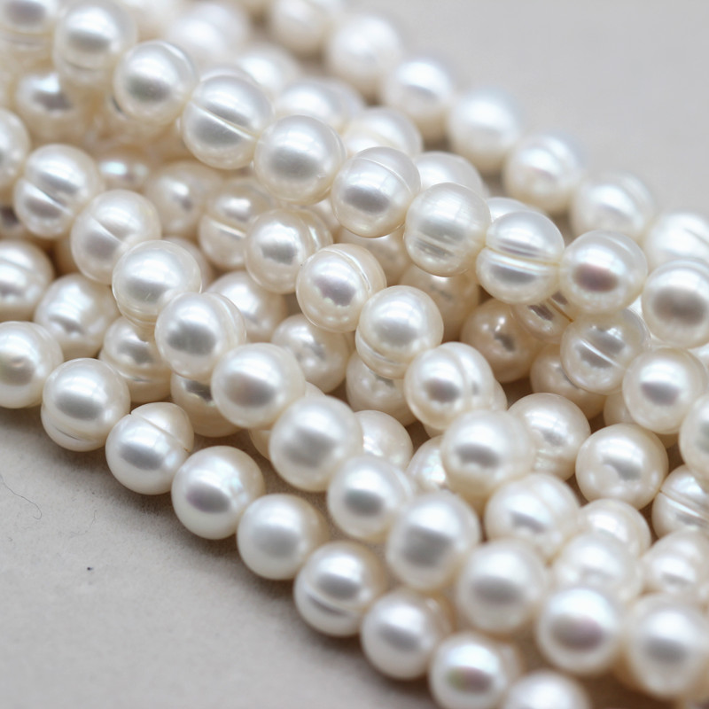 7-8mm Cheap Round Ringed Cultured Natural Freshwater Pearl Strings (XL180020)