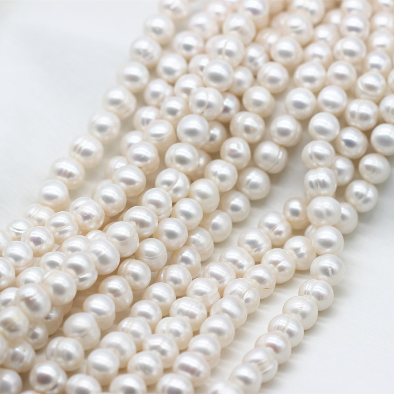 10-11mm Cheap Round Ringed Natural Cultured Freshwater Pearl Strings (XL180023)