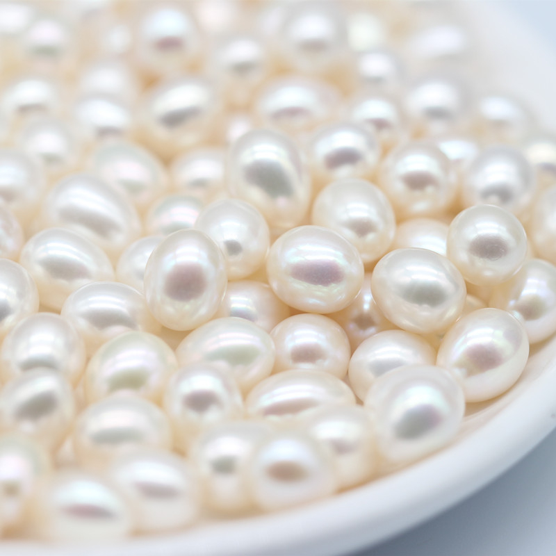 Oval/Rice AAAA White Natural Cultured Freshwater Pearls (XL110054)