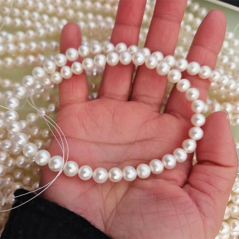  5-6mm Aaaa High Quality Round Cultured Freshwater Pearl Strings Wholesale (XL180111) 