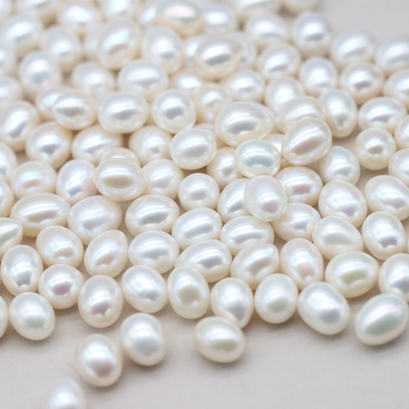 Oval/Rice AAAA White Natural Cultured Freshwater Pearls (XL110054)