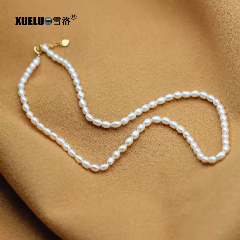 Fashionable Sterling Silver Jewelry Real Oval Freshwater Pearl Necklace (XL120105)