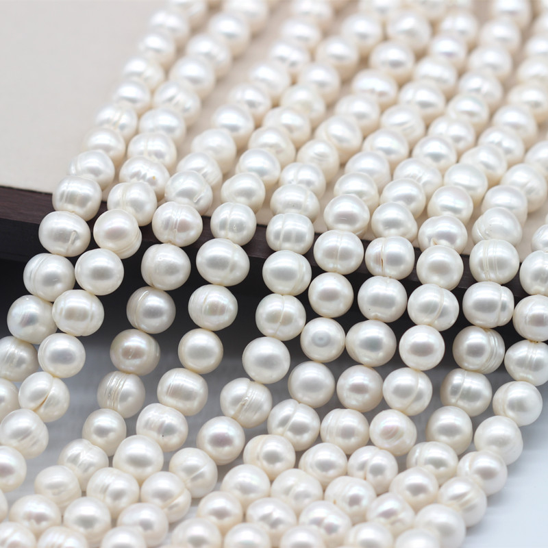 10-11mm Cheap Round Ringed Natural Cultured Freshwater Pearl Strings (XL180023)