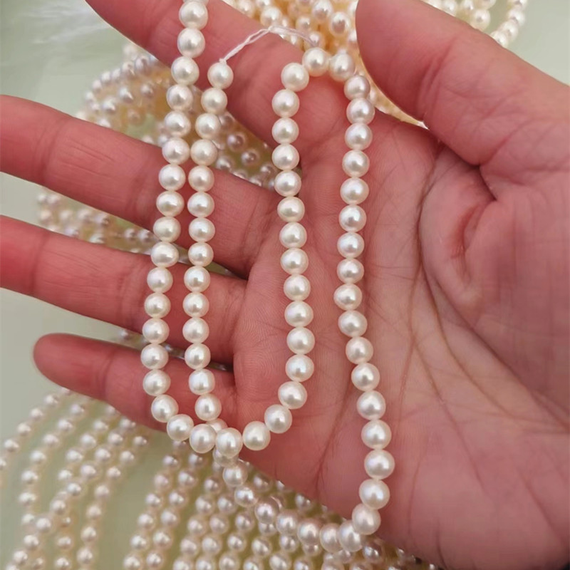  5-6mm Aaaa High Quality Round Cultured Freshwater Pearl Strings Wholesale (XL180111) 