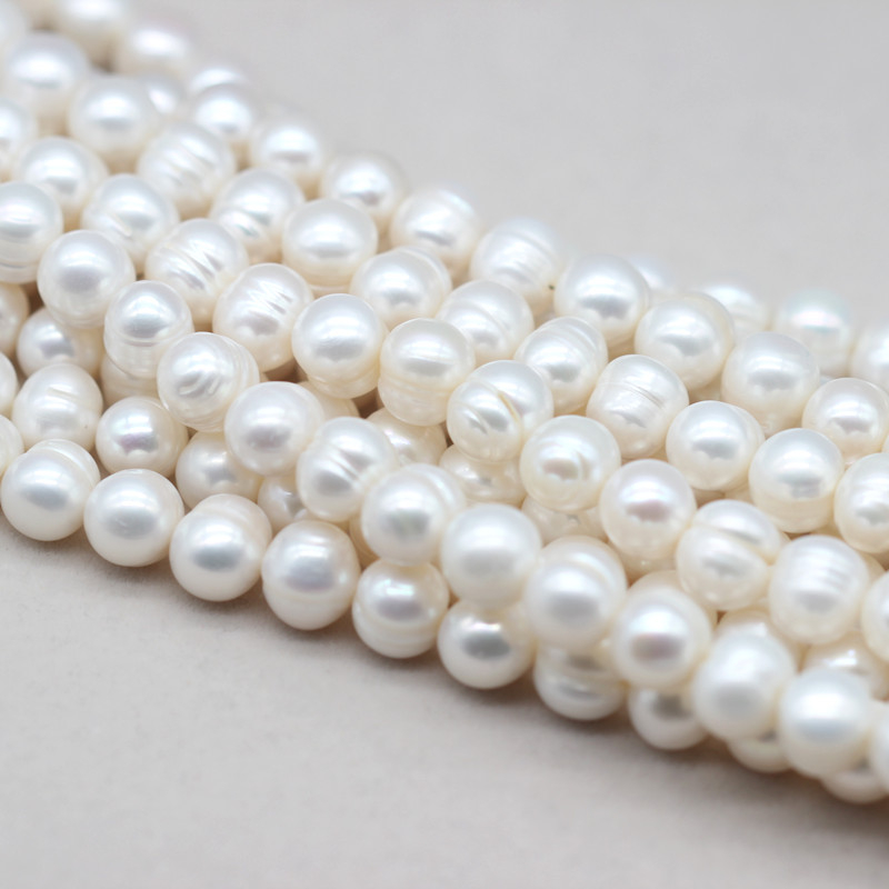 10-11mm Cheap Round Ringed Natural Cultured Freshwater Pearl Strings (XL180023)