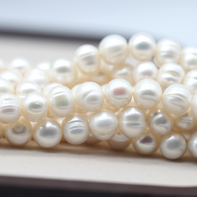 10-11mm Cheap Round Ringed Natural Cultured Freshwater Pearl Strings (XL180023)